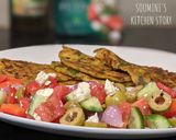 A picture of step 10 of Cucumber and Spinach Pancakes with Greek Salad.
