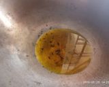 A picture of step 2 of Poha chivda.