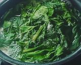 A picture of step 1 of Palak Corn Curry.