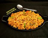 A picture of step 6 of Veg Schezwan Fried Matta Red Rice.