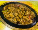 A picture of step 11 of Kung pao chicken with egg fried rice.