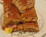 Foto del paso 4 de la receta: Rollitos de pan de molde con aguacate queso, pavo