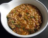 A picture of step 4 of Spicy Meat Sauce.