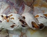 Foto del paso 4 de la receta: Pan casero relleno con pasas de uva y dulce de batata🧉