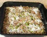 A picture of step 2 of Alpen and Lotus biscoff squares.