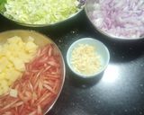 A picture of step 1 of Tomato Masala Macaroni.