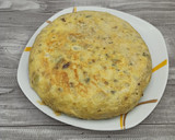 Foto del paso 3 de la receta: Tortilla de patata rellena de champiñones y queso azul