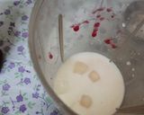 A picture of step 2 of Strawberry crushed milk shake with vanilla ice cream.