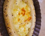 A picture of step 5 of Khachapuri with four cheese.
