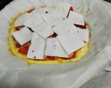Foto del paso 9 de la receta: Pizza de tortilla con salchicha, jamón, queso y tomate