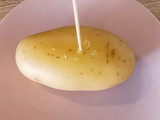 Mini Pulpitos salteados al ajillo sobre Cremoso de Patata