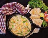 A picture of step 6 of Nawabi Paneer Korma in white Gravy.