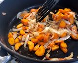 A picture of step 2 of Curried sausages.