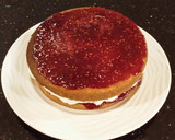 A picture of step 18 of Vanilla Lemon Raspberry Layer Cake with Whipped Cream Buttercream Frosting.