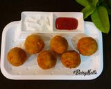 A picture of step 10 of Cheesy Chutney Aloo Bombs.