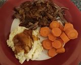 A picture of step 5 of Slow cooked beef brisket, mash carrots and onion gravy.