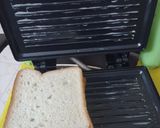 A picture of step 5 of Cheese spread vegetable sandwich.
