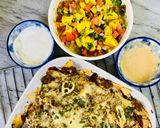 A picture of step 9 of Loaded Nachos with Mango Salsa, Sour cream and cheese sauce.