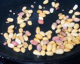 A picture of step 4 of Roasted sunflower seeds & other seeds spiced jaggery brittle.
