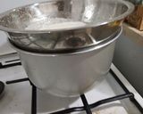 A picture of step 8 of No machine Fig and Cinnamon Ice-cream garnished with cookies.