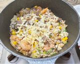 A picture of step 12 of Fried Beef and Shrimp Rice on the Table.