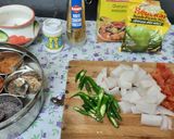 A picture of step 2 of Carrot and radish green chilli pickle.