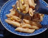 A picture of step 6 of Penne ai funghi (Penne in Mushroom Sauce).