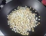 A picture of step 1 of Daliya Chikki / Roasted Puff Chana Chikki.