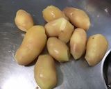 Une image de l'étape 3 de Salade de pommes de terre aux tomates, poivrons, artichauts et olives.