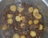 A picture of step 5 of Beef pilau.