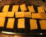 Foto del paso 9 de la receta: Repollo negro queseado y pollo con ajo y koli rabo horneados