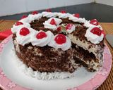 A picture of step 6 of Black forest ice cream cake.