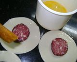 Foto del paso 3 de la receta: Ojitos de longaniza con hojaldre - bol au vent
