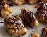Foto del paso 5 de la receta Canutillo de hojaldre relleno de crema de cacahuete