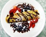 Foto del paso 5 de la receta: CREPES O PANQUEQUES DE ARÁNDANOS, FRAMBUESAS, FRUTILLAS CON SIROPE DE CHOCOLATE