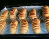 A picture of step 11 of Nutella stuffed caterpillar buns.