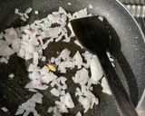 A picture of step 1 of Tomato paneer rice.