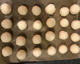 A picture of step 4 of Easy 3-Ingredient Coconut Snowballs.