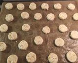 Foto del passaggio 7 della ricetta Biscotti con arance candite e nocciole