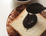 A picture of step 5 of Bread cake with Oreo frosting.