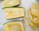 A picture of step 1 of Zucchini stuffed with cheesy Guacamole.