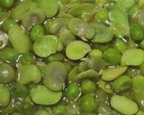 Foto del passaggio 9 della ricetta Cavatelli rigati e pesto di baccelli di fave con fave e piselli