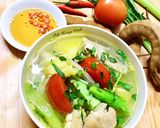 Hình bước làm 3 của món Canh Chua Nấu Với Cánh Gà