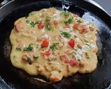 A picture of step 6 of Besan onion tomato chilla.