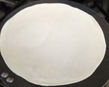 A picture of step 5 of Taco Bell crunchy wrap.