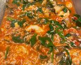 A picture of step 4 of Chicken and mushroom baked rice.