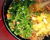 A picture of step 4 of Pineapple Thai fried rice.