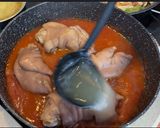 Foto del paso 6 de la receta: Manitas de cerdo en salsa con garbanzos