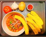 A picture of step 11 of Lasaniya Bhungla Batata🥔🌶️🧄🍅Kathiyawadi Garlicky Potato Curry Served with Piped fryums😋.