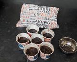 A picture of step 2 of Chocolate cup cakes with harshley Syrup and choco chips.